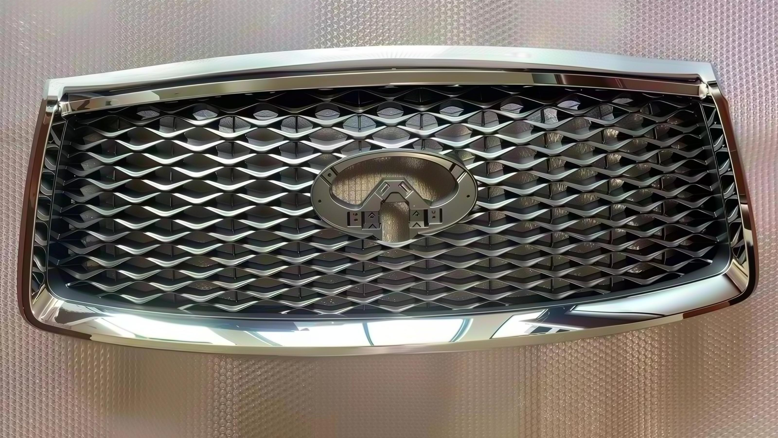 561081b268ae02065cc8628479ae9d98 Front Grille For Infiniti QX80 2019-2023 Chrome Outer Frame Gray Base OE 62310-6GW0A - Image 1